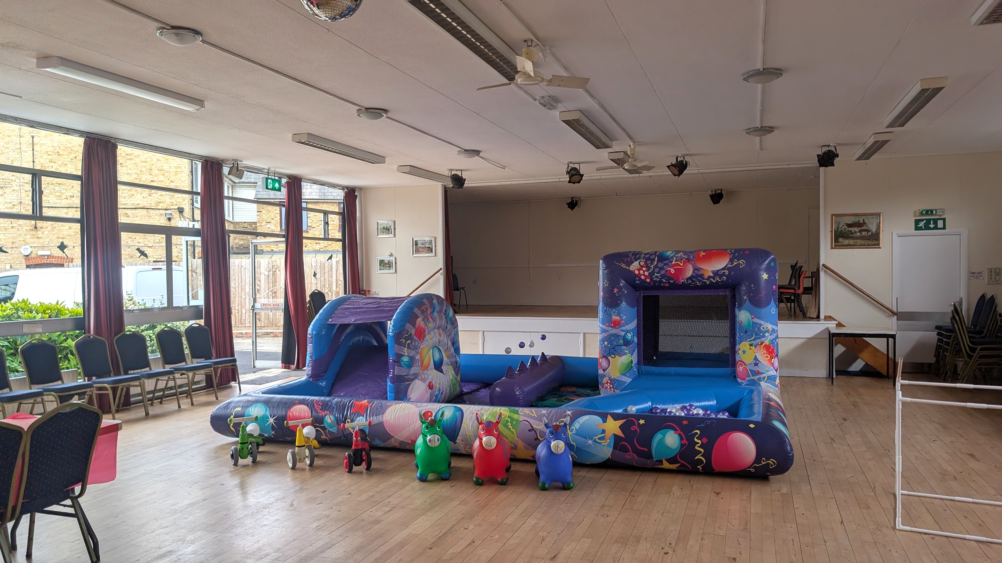 Toddler bouncy castle set up inside riverside hall in ware