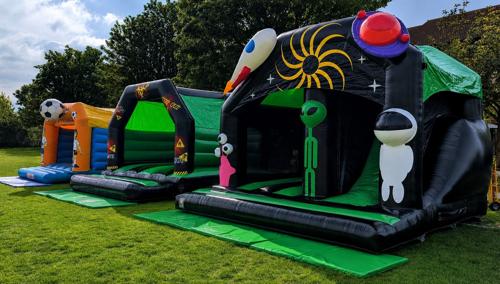 bouncy castles set up at grundy park, cheshunt for an event
