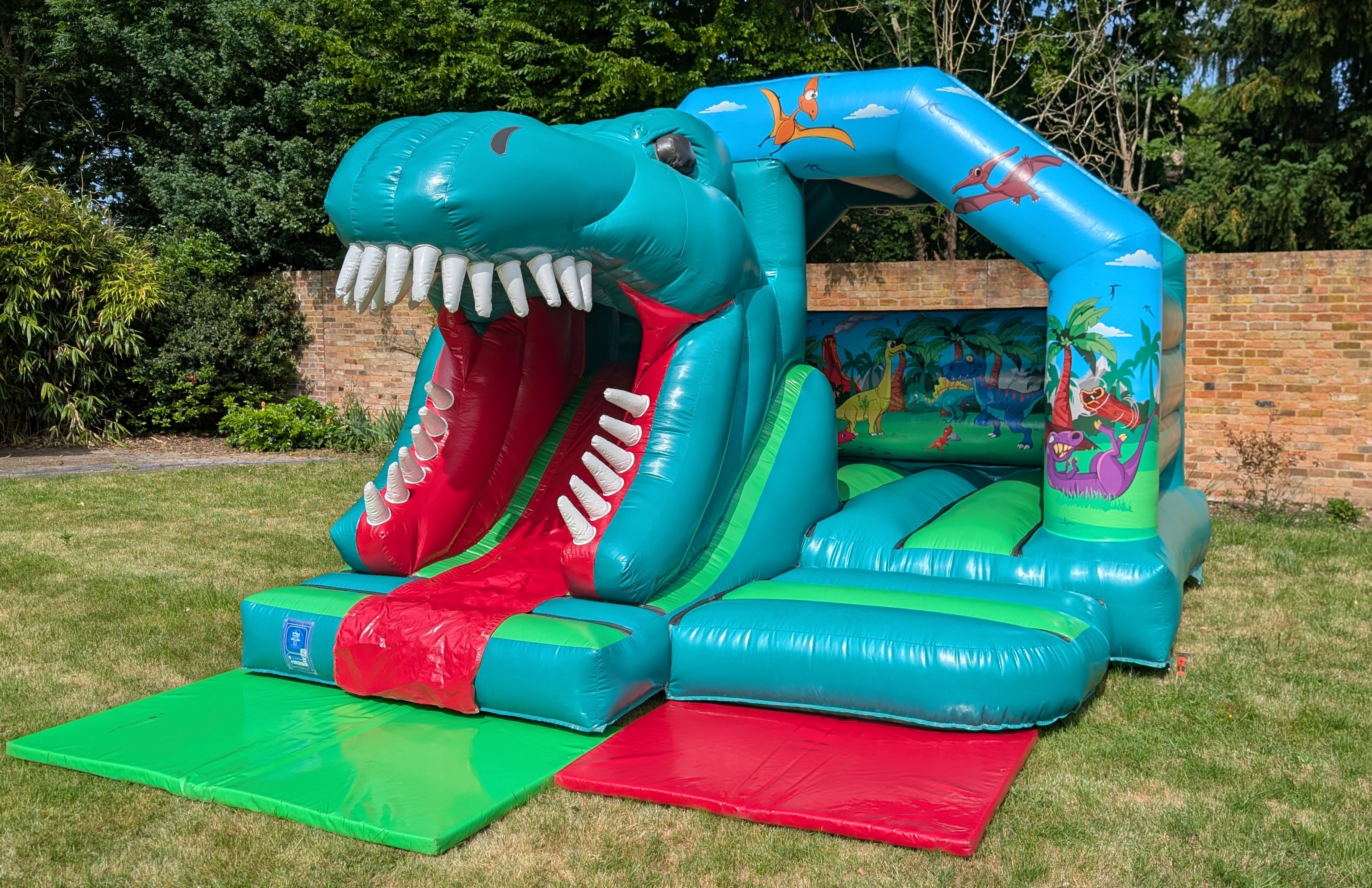 Dinosaur bouncy castle with slide hire in Harlow