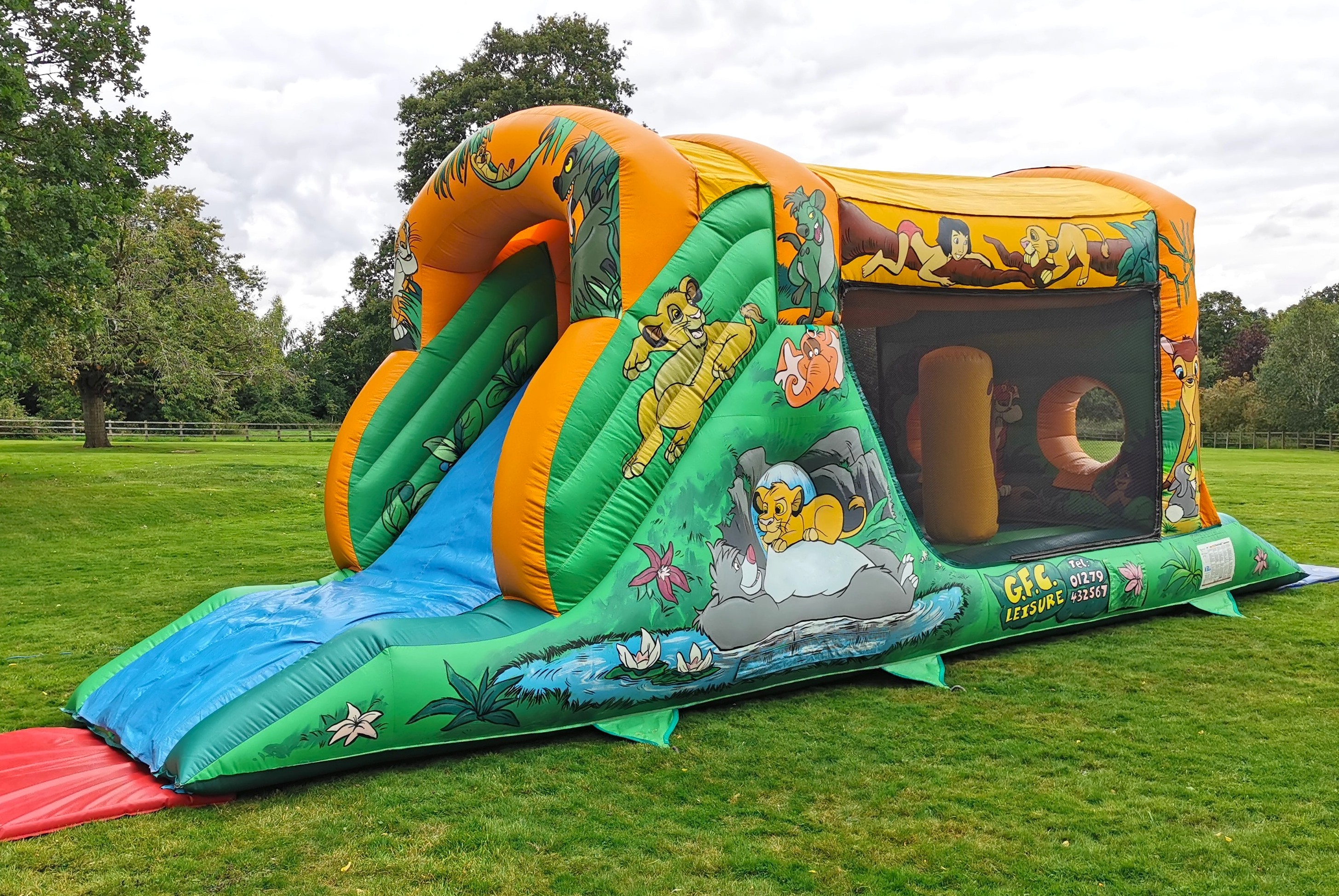 Jungle inflatable obstacle course hire outdoor setup