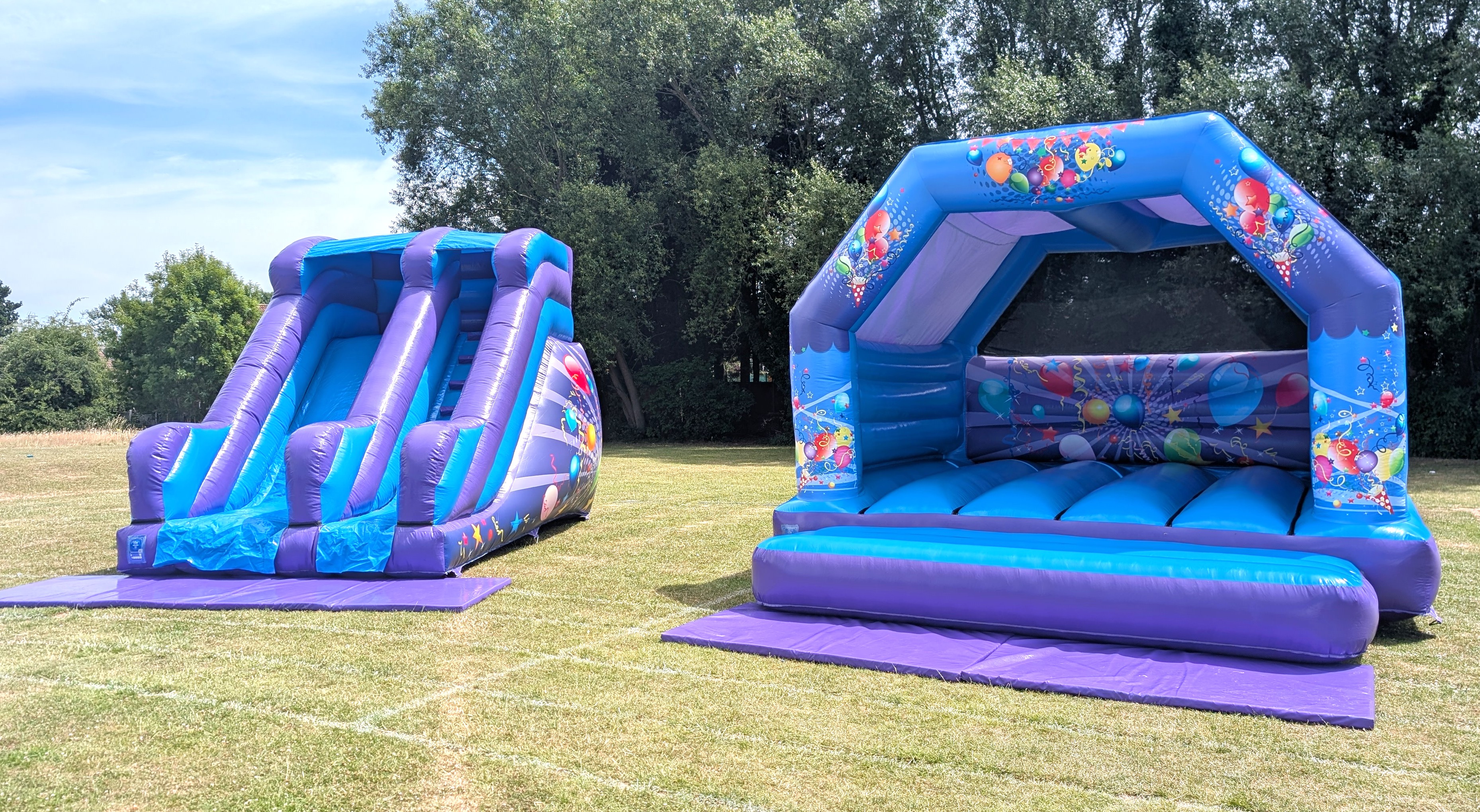 Party bouncy castle and slide package set up at a school in loughton
